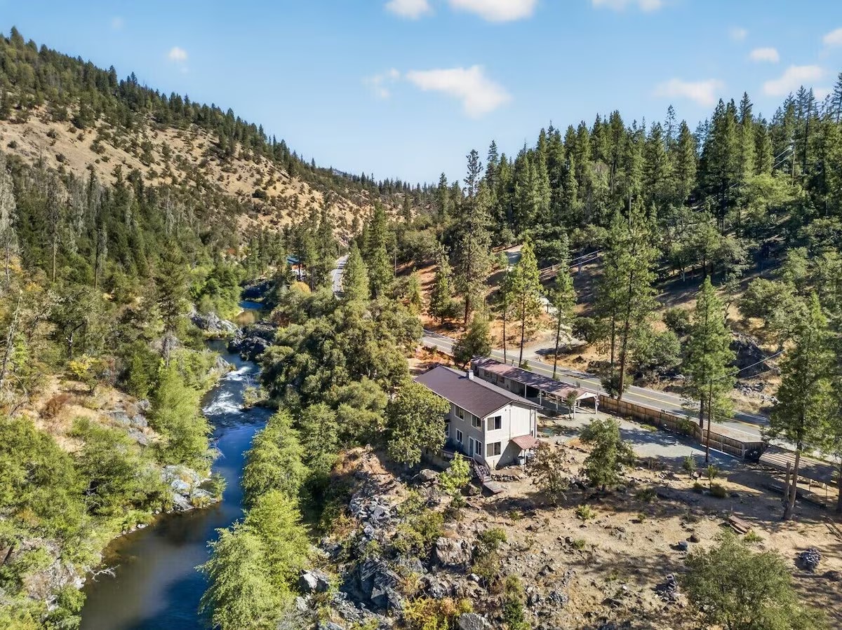 Aerial view of the property nestled in the river canyon
